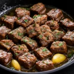 Garlic Butter Steak Bites: The Ultimate Guide to Perfectly Juicy Steak Bites 6 Juicy garlic butter steak bites sizzling in a cast iron skillet